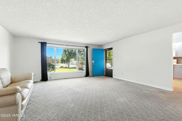 4504 W Lincoln Ave, Yakima, WA 98908 - carpeted living room with a textured ceiling