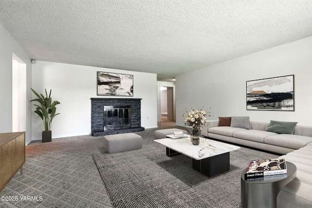 4504 W Lincoln Ave, Yakima, WA 98908 - living room with carpet floors, a glass covered fireplace, and a textured ceiling