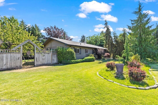 view of yard featuring fence