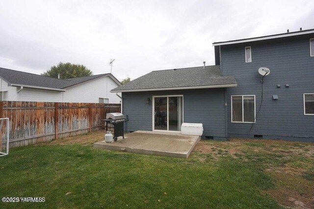 6504 Terry Ave, Yakima, WA 98908 - rear view of house with a patio, crawl space, a lawn, and fence