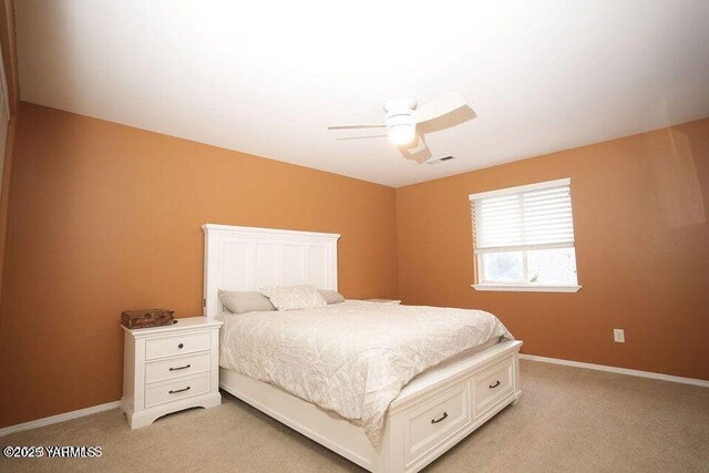 6504 Terry Ave, Yakima, WA 98908 - bedroom featuring baseboards, a ceiling fan, visible vents, and light colored carpet