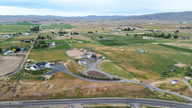 7773 N Wenas Rd, Selah, WA 98942 - aerial view of property and surrounding area featuring rural landscape and a mountain backdrop