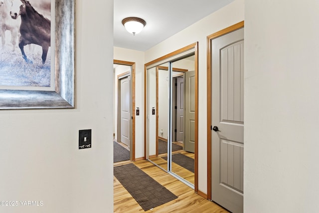 7773 N Wenas Rd, Selah, WA 98942 - hallway featuring light wood-style flooring and baseboards