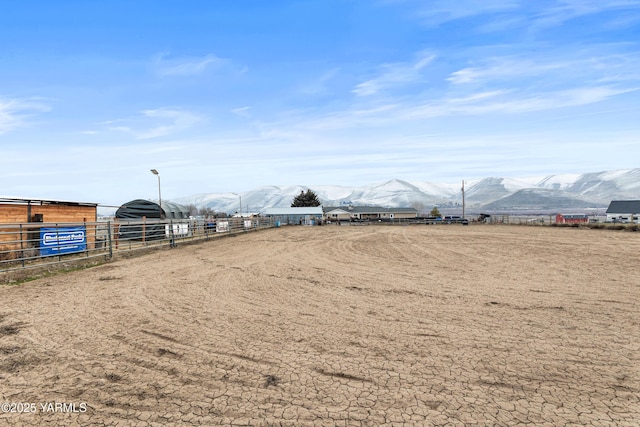 7773 N Wenas Rd, Selah, WA 98942 - view of yard with a mountain view, an enclosed horse arena, and fence