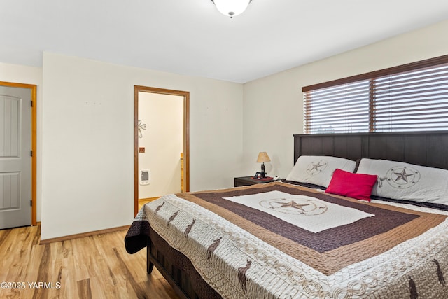 7773 N Wenas Rd, Selah, WA 98942 - bedroom featuring light wood-style flooring and baseboards