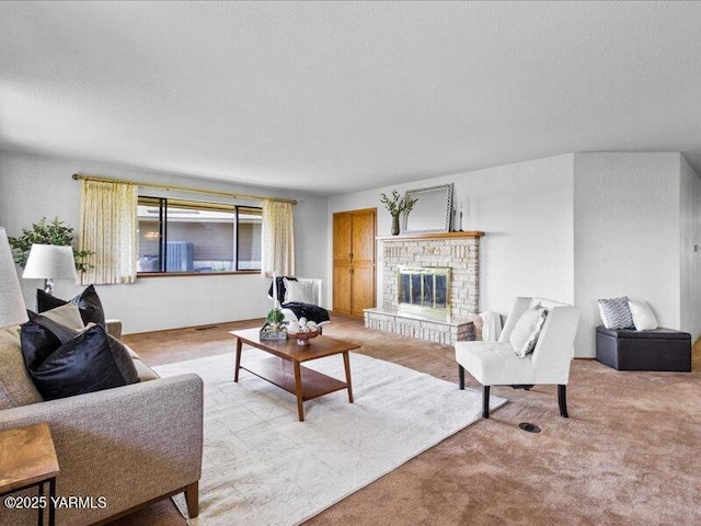 carpeted living area featuring a fireplace