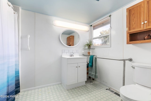 full bathroom featuring tile patterned floors, vanity, toilet, and visible vents
