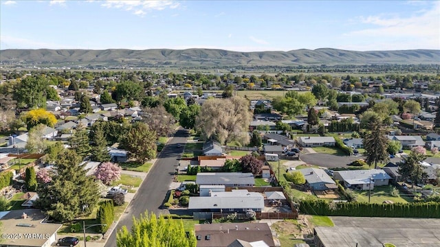 aerial view featuring a mountain view and a residential view