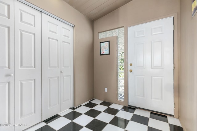 foyer with dark floors