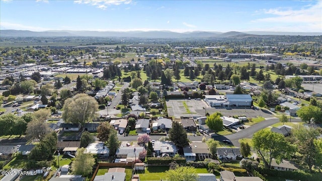 drone / aerial view featuring a mountain view and a residential view