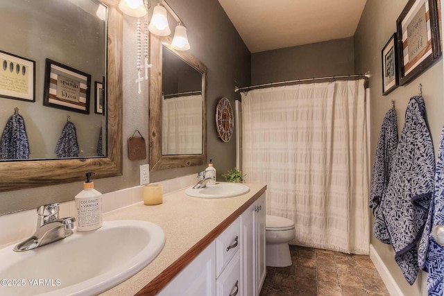 11300 Flintstone Rd, Yakima, WA 98908 - bathroom featuring double vanity, stone finish floors, and curtained shower