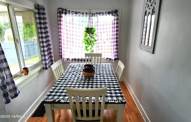 4511 Englewood Ave, Yakima, WA 98908 - dining room with healthy amount of natural light, baseboards, and wood finished floors