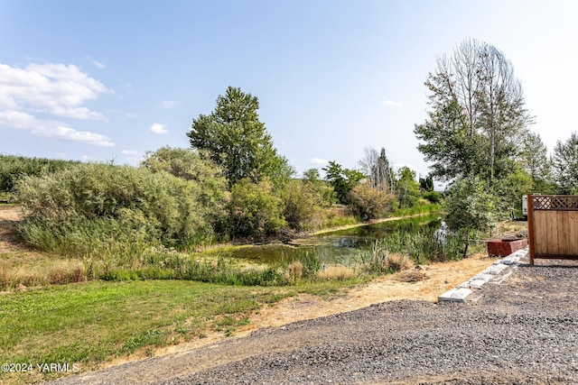 view of yard featuring a water view