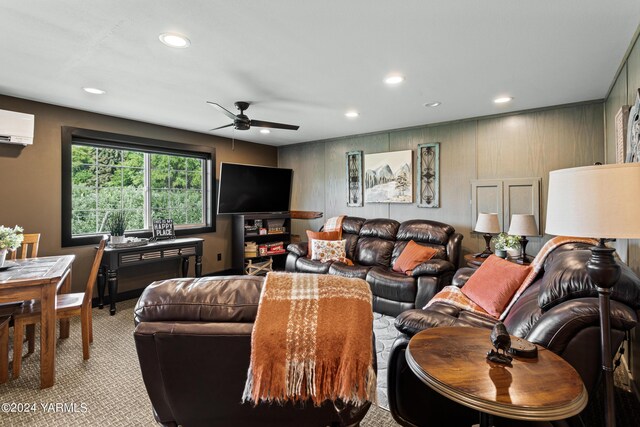 living room with recessed lighting, a ceiling fan, carpet flooring, and an AC wall unit