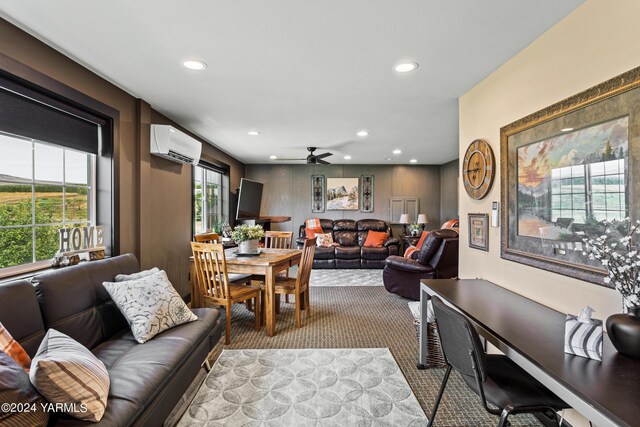 carpeted living room featuring recessed lighting, an AC wall unit, and ceiling fan