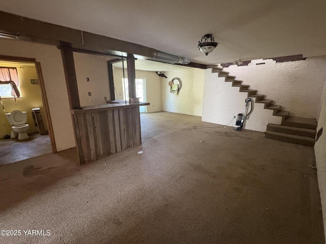 interior space with stairway and light carpet