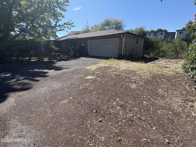 exterior space featuring driveway
