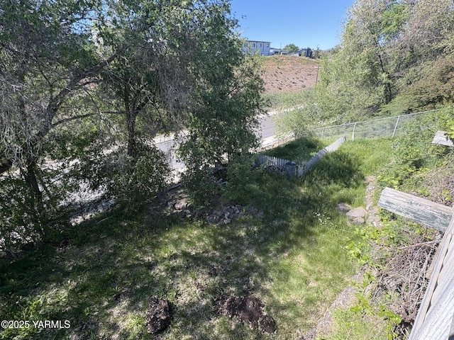 view of yard featuring fence
