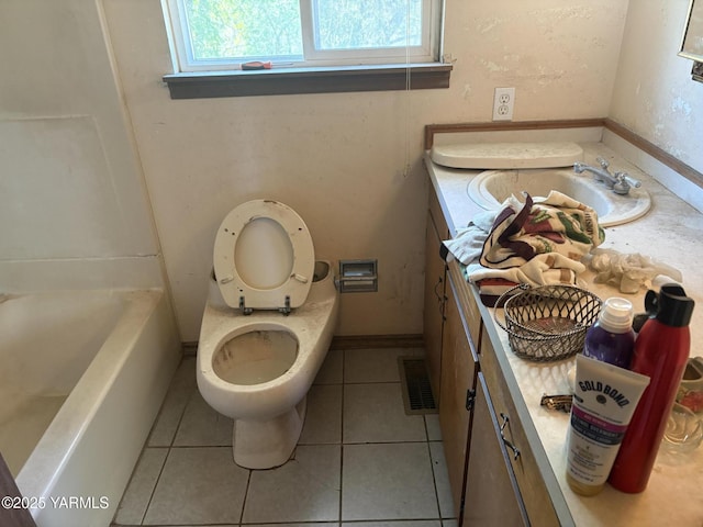 bathroom with vanity, a washtub, a wealth of natural light, and tile patterned floors