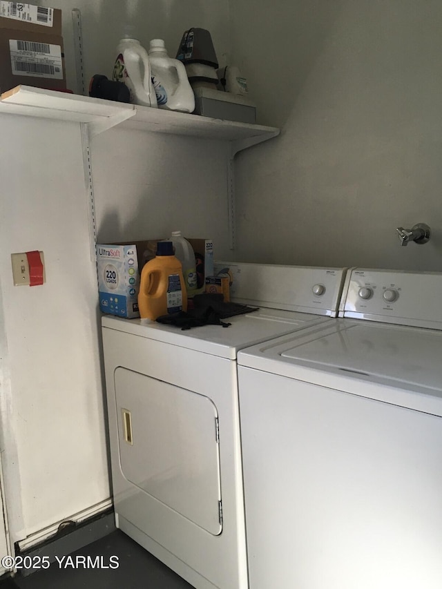 laundry room featuring laundry area and washing machine and clothes dryer