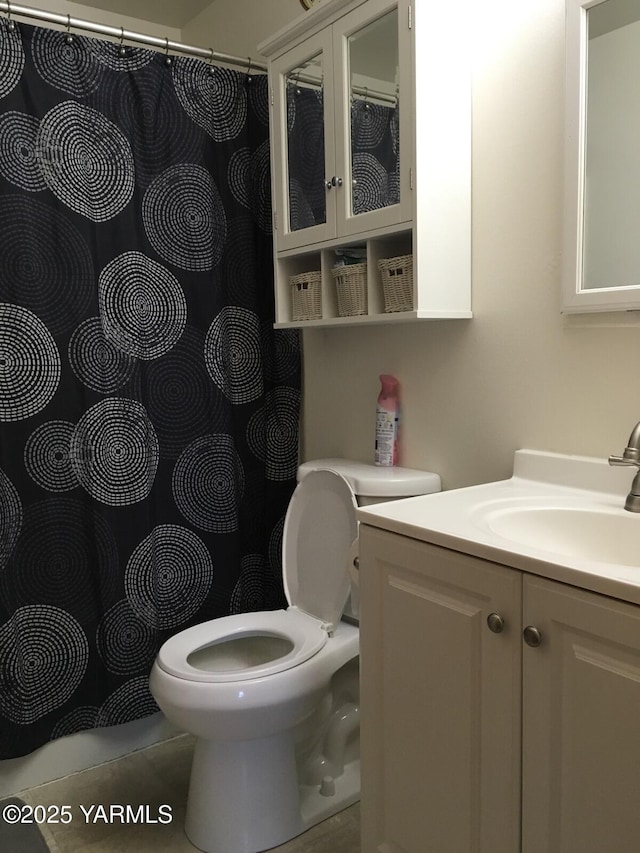 full bath with toilet and vanity