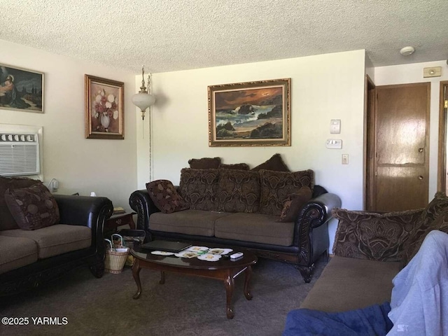 living area featuring carpet flooring, a wall unit AC, and a textured ceiling