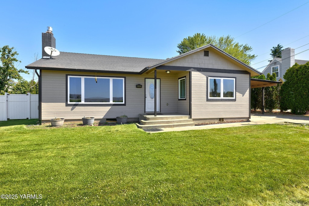 4503 Terrace Heights Dr, Yakima, WA 98901 - view of front of house with a chimney, a carport, and a shingled roof