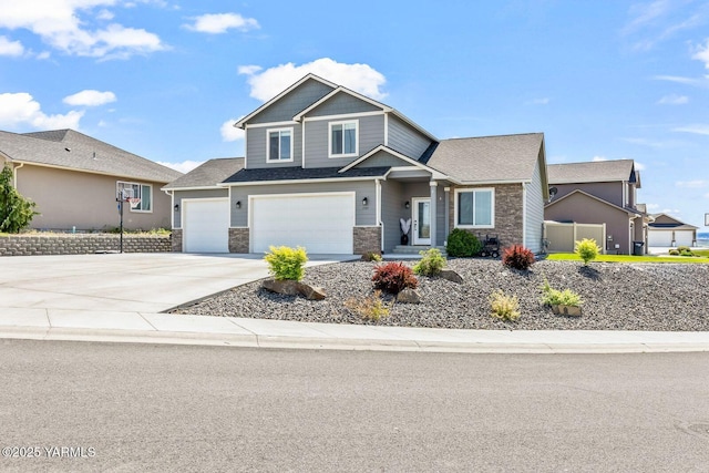 1589 Valhalla Loop, Selah, WA 98942 - craftsman house with stone siding, concrete driveway, and a garage