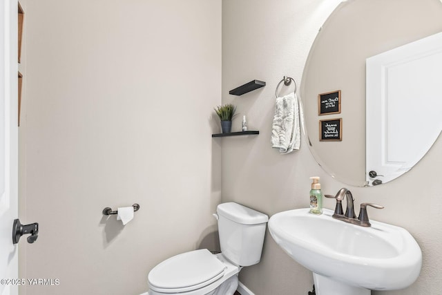 1589 Valhalla Loop, Selah, WA 98942 - half bathroom featuring toilet and a sink