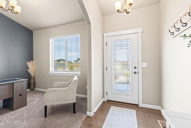 1589 Valhalla Loop, Selah, WA 98942 - foyer with a chandelier, healthy amount of natural light, arched walkways, and wood finished floors