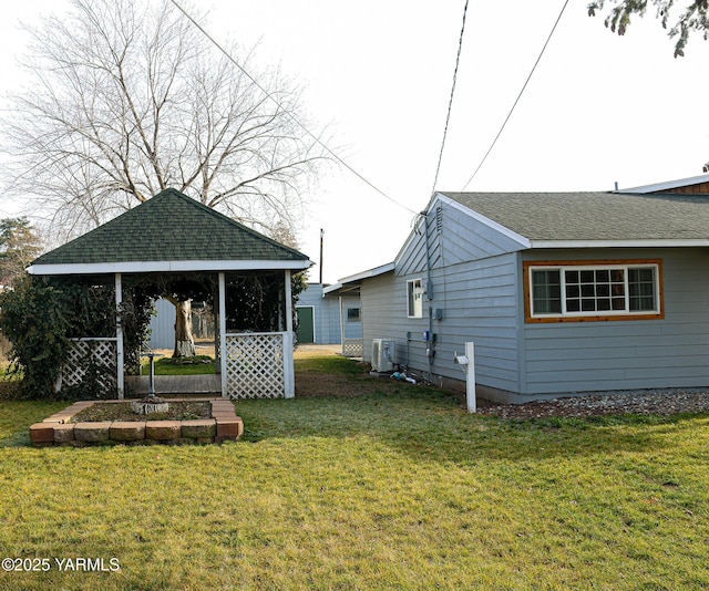 exterior space featuring a gazebo and central air condition unit