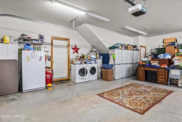 garage with freestanding refrigerator, independent washer and dryer, and a garage door opener