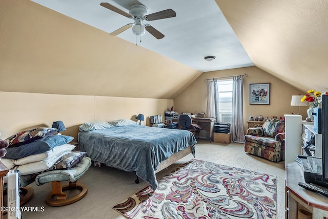 bedroom featuring lofted ceiling and a ceiling fan