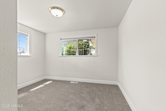 5804 W Walnut St, Yakima, WA 98908 - spare room featuring carpet and plenty of natural light
