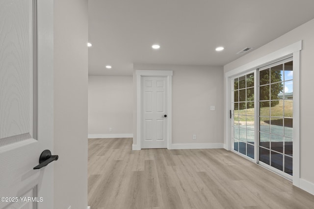 5804 W Walnut St, Yakima, WA 98908 - empty room with light wood-style flooring and recessed lighting