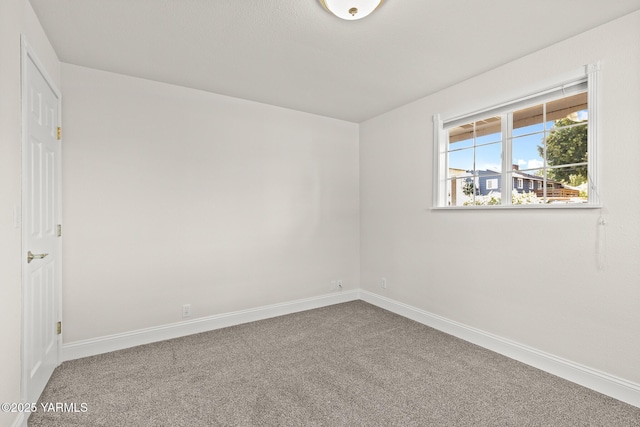 5804 W Walnut St, Yakima, WA 98908 - spare room featuring carpet and baseboards