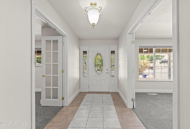 5804 W Walnut St, Yakima, WA 98908 - carpeted entryway with tile patterned flooring and baseboards