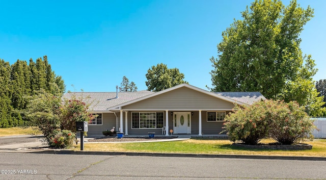 5804 W Walnut St, Yakima, WA 98908 - ranch-style house with a shingled roof and covered porch