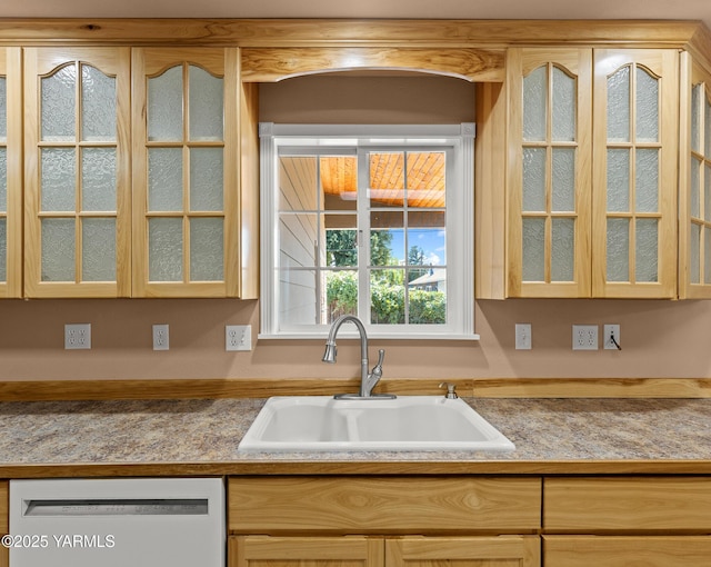 5804 W Walnut St, Yakima, WA 98908 - kitchen with dishwasher, glass insert cabinets, and light countertops