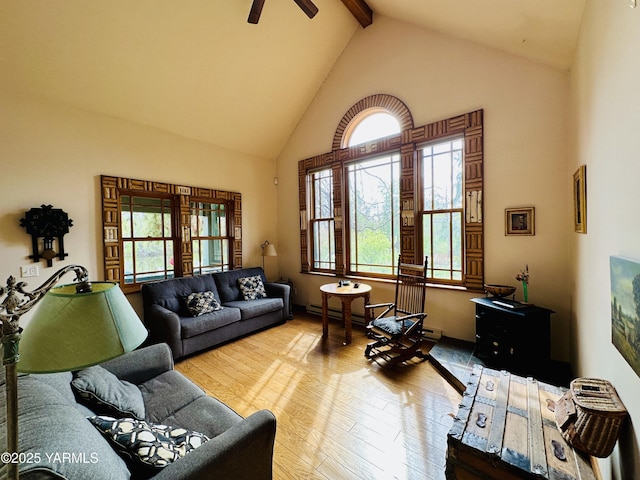1465 Cook Rd, Yakima, WA 98908 - living room with high vaulted ceiling, hardwood / wood-style flooring, beamed ceiling, and ceiling fan