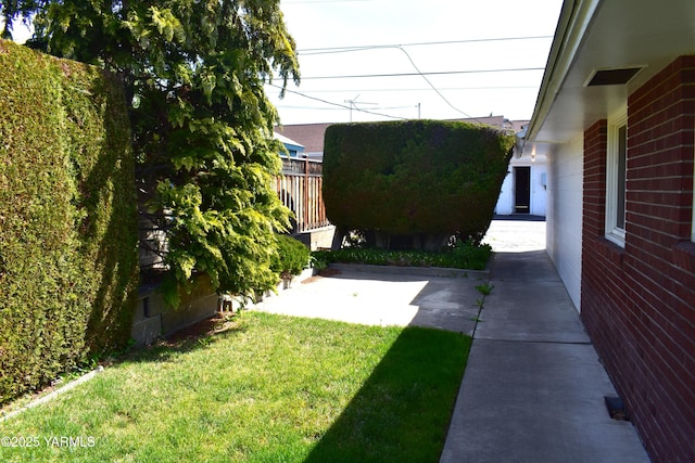 view of yard with fence