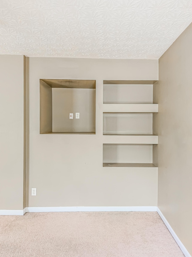 interior space featuring a textured ceiling