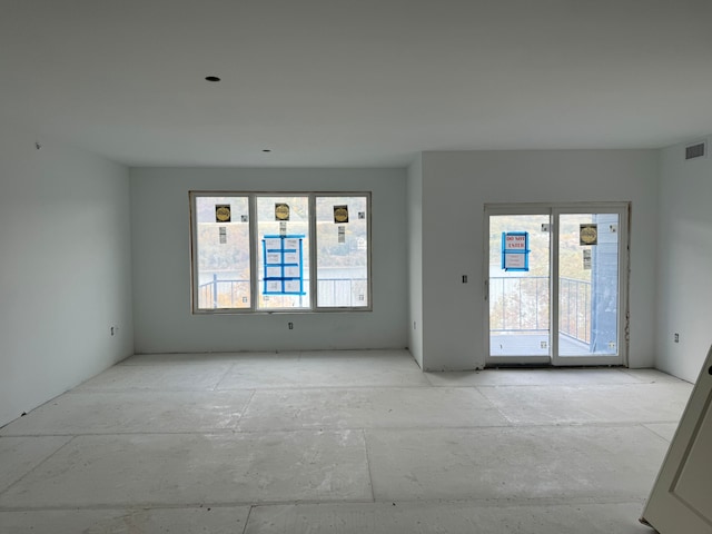 empty room featuring plenty of natural light