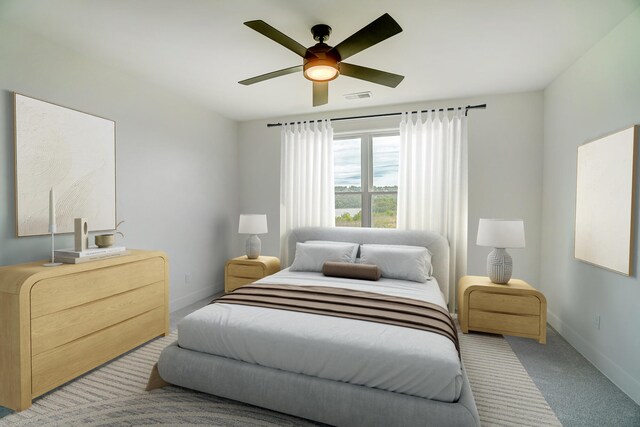 bedroom featuring ceiling fan and carpet flooring