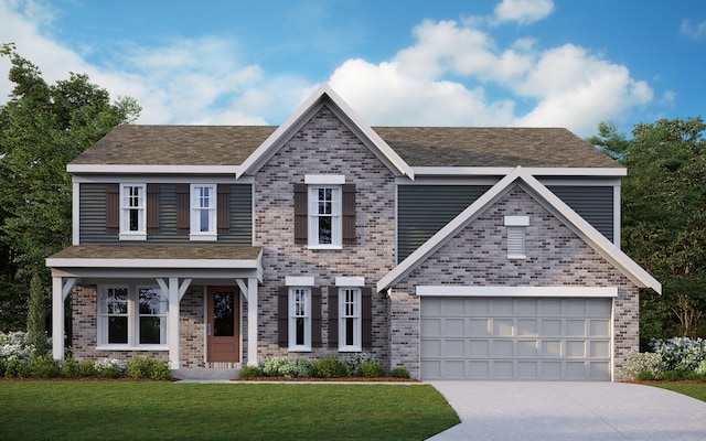 view of front facade with a front yard and a garage