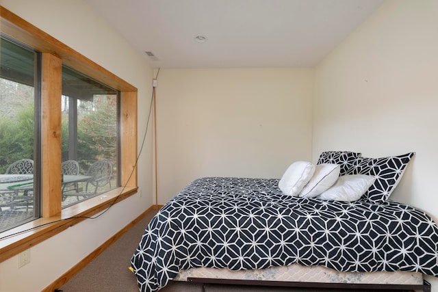 bedroom featuring carpet flooring