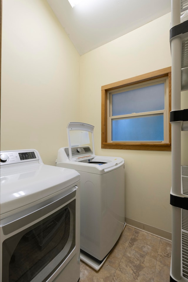 laundry room with washer and dryer