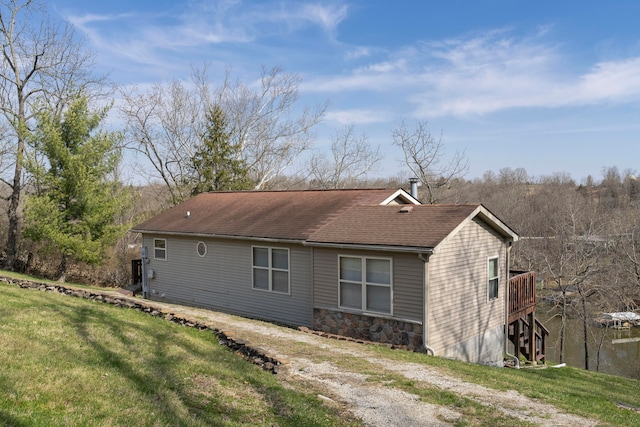 exterior space featuring a yard and a deck