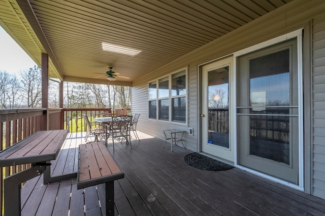 wooden terrace with ceiling fan