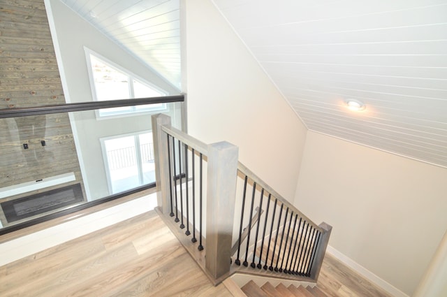 465 Cedar Hill Dr, Williamstown, KY 41097 - staircase featuring wood finished floors, lofted ceiling, and baseboards